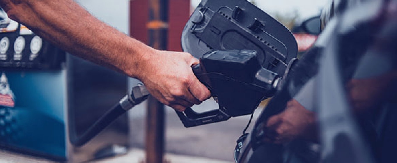 pumping gas into a car