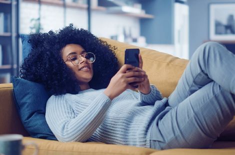 Woman getting a mortgage pre-approval on her cell phone