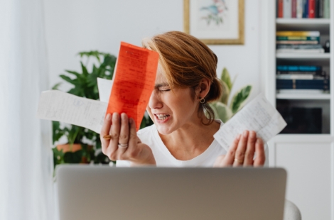 a young woman stressing about her finances