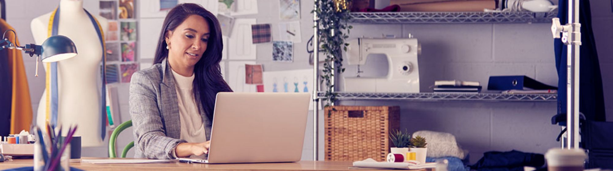 young woman entrepreneur working at her desk