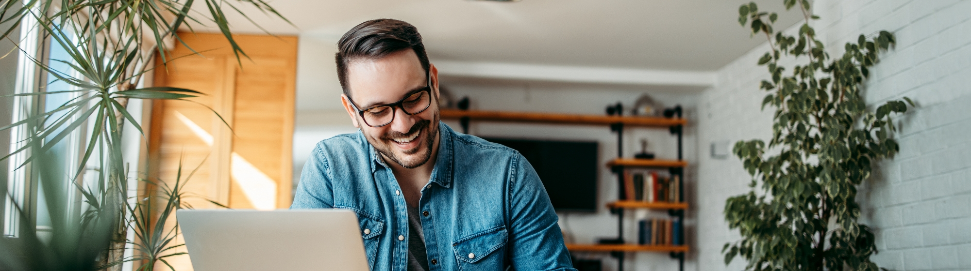 middle aged man applying for a home equity on computer