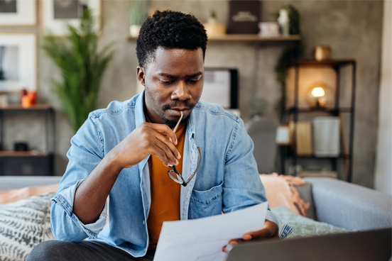 young man going over his finances